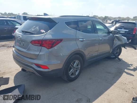 2018 Hyundai Santa Fe 2.4L z VIN 5NMZUDLB1JH065408, wystawiony jako IAAI lot #43342396 z przebiegiem 113 154 mil mil oraz . Historia ofert i sprzedaży dostępna na DreamBid. Obrazek 4.