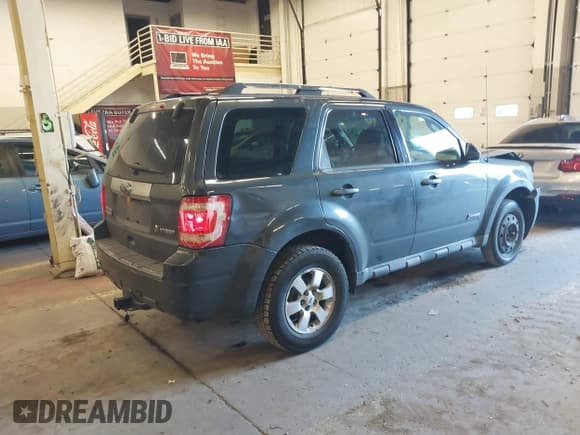 ✅ 2010 Ford Escape Hybrid • VIN: 1FMCU4K39AKC83189 • Lot: 41544476. Listed on IAAI with 219,041 mi. Free auction sales archive from the USA and detailed vehicle history report at DreamBid. Image 4.