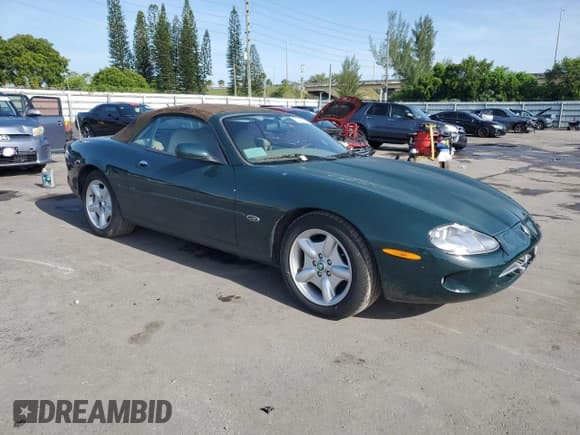 ✅ 1998 Jaguar XK • VIN: SAJGX2245WC027810 • Лот: 70329715. Опубликован ранее на Copart с пробегом Не указан. Бесплатный доступ к архиву аукционных продаж из США и подробный отчёт об истории автомобиля на DreamBid. Изображение 4.