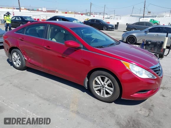 ✅ 2013 Hyundai Sonata GLS • VIN: 5NPEB4AC4DH638213 • Lot: 43013055. Listed on IAAI with 97,373 mi. Free auction sales archive from the USA and detailed vehicle history report at DreamBid. Image 1.