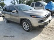 ✅ 2016 Jeep Cherokee Latitude • VIN: 1C4PJMCB8GW296554 • Lot: 84764875. Listed on Copart with 64,170 mi. Free auction sales archive from the USA and detailed vehicle history report at DreamBid. Image 4.