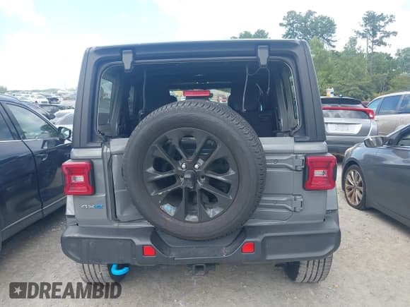 ✅ 2023 Jeep Wrangler Sahara • VIN: 1C4JJXP67PW641660 • Lot: 43045618. Listed on IAAI with 53,182 mi. Free auction sales archive from the USA and detailed vehicle history report at DreamBid. Image 16.