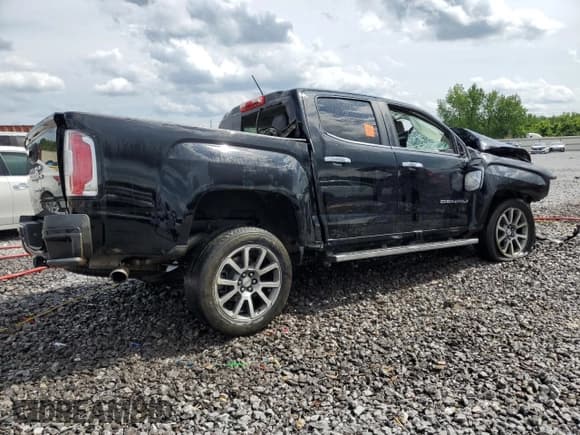 ✅ 2021 GMC Canyon 4WD Denali • VIN: 1GTG6EEN5M1142648 • Лот: 58559805. Опубликован ранее на Copart с пробегом Не указан. Бесплатный доступ к архиву аукционных продаж из США и подробный отчёт об истории автомобиля на DreamBid. Изображение 3.