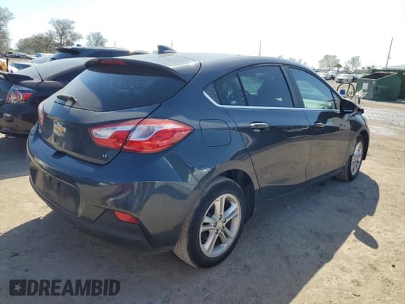 ✅ 2018 Chevrolet Cruze LT • VIN: 3G1BE6SM5JS601680 • Lot: 41832083. Listed on Copart with 82,357 mi. Free auction sales archive from the USA and detailed vehicle history report at DreamBid. Image 3.