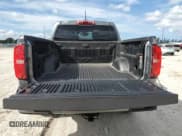 ✅ 2019 Chevrolet Colorado 2WD LT • VIN: 1GCGSCENXK1306568 • Лот: 71626554. Опубликован ранее на Copart с пробегом 68 043 миль. Бесплатный доступ к архиву аукционных продаж из США и подробный отчёт об истории автомобиля на DreamBid. Изображение 6.