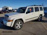 ✅ 2009 Jeep Commander Sport • VIN: 1J8HG48K89C535741 • Lot: 43759225. Listed on Copart with 140,357 mi. Free auction sales archive from the USA and detailed vehicle history report at DreamBid. Image 1.