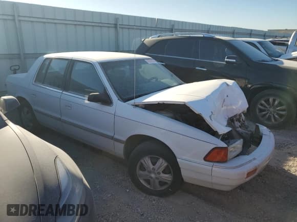 ✅ 1993 Plymouth Acclaim • VIN: 3P3XA46K9PT641785 • Лот: 82825254. Опубликован ранее на Copart с пробегом 107 752 миль. Бесплатный доступ к архиву аукционных продаж из США и подробный отчёт об истории автомобиля на DreamBid. Изображение 4.