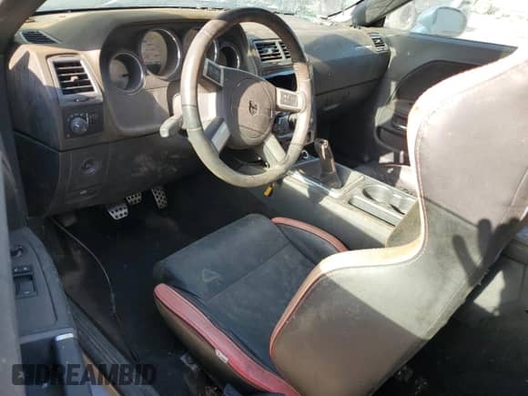 2009 Dodge Challenger SRT-8 z VIN 2B3LJ74W29H563241, wystawiony jako Copart lot #73367354 z przebiegiem Nie podano mil oraz Czysty tytuł • Clean title. Historia ofert i sprzedaży dostępna na DreamBid. Obrazek 8.