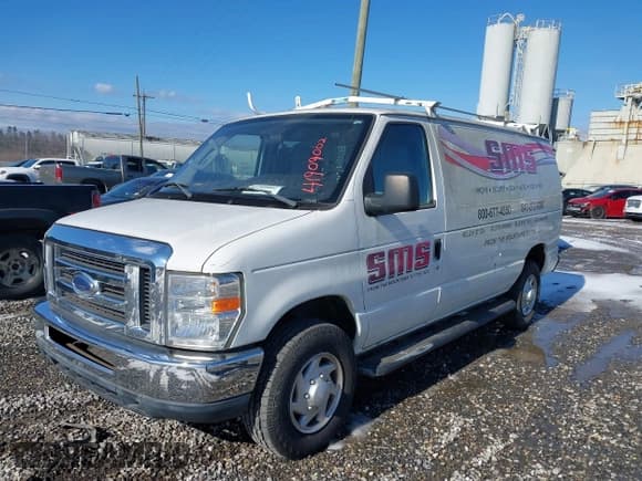 ✅ 2014 Ford Econoline Cargo Commercial • VIN: 1FTNE2EW3EDA18900 • Lot: 41209002. Listed on IAAI with 138,014 mi. Free auction sales archive from the USA and detailed vehicle history report at DreamBid. Image 2.