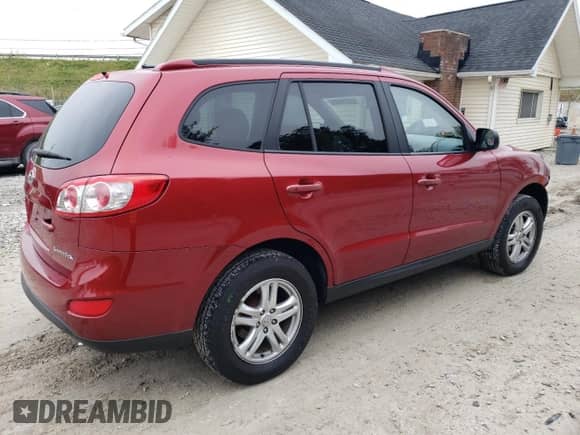 2010 Hyundai Santa Fe GLS with VIN 5NMSG3AB5AH330269, listed as a Copart auction lot 73478194 with 143,938 mi miles and Salvage title. Bid and sale history available at DreamBid. Image 3.