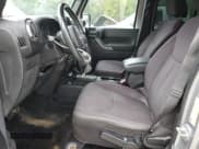 ✅ 2013 Jeep Wrangler Unlimited Sport • VIN: 1C4BJWDG8DL670299 • Lot: 83804925. Wystawiony na Copart z przebiegiem 104 418 mil. Bezpłatny archiwum sprzedaży aukcyjnych z USA i szczegółowy raport historii pojazdu na DreamBid. Zdjęcie 7.