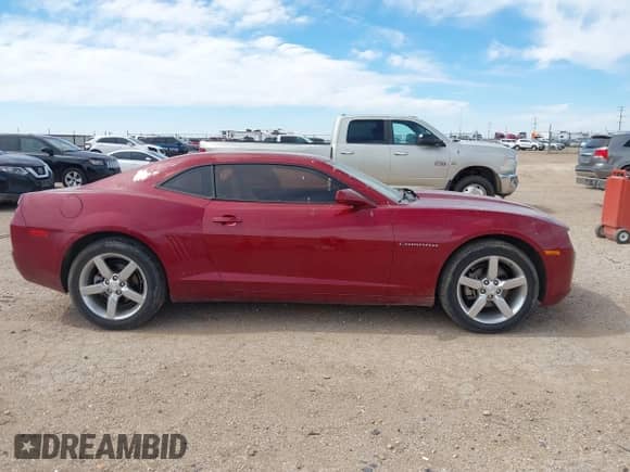 2011 Chevrolet Camaro 1LT z VIN 2G1FB1ED2B9168150, wystawiony jako IAAI lot #43295127 z przebiegiem 134 027 mil mil oraz . Historia ofert i sprzedaży dostępna na DreamBid. Obrazek 13.