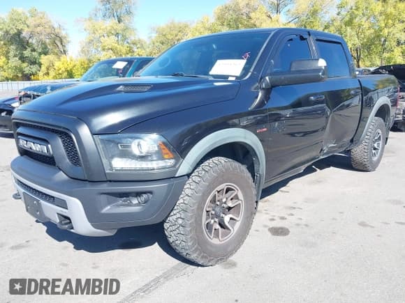 ✅ 2017 Ram 1500 Rebel • VIN: 1C6RR7YT7HS501995 • Lot: 43504363. Listed on IAAI with 154,610 mi. Free auction sales archive from the USA and detailed vehicle history report at DreamBid. Image 18.