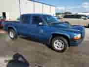 2002 Dodge Dakota Sport с VIN 1B7HL38N72S589857, выставлен на аукционе Copart как лот 77138924 с пробегом 197 117 миль миль и Списание • Salvage title. История ставок и продаж доступна на DreamBid. Изображение 4.