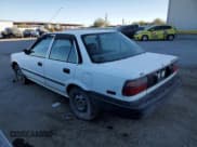 ✅ 1990 Toyota Corolla • VIN: 1NXAE94A9LZ084244 • Lot: 41419155. Wystawiony na Copart z przebiegiem 221 586 mil. Bezpłatny archiwum sprzedaży aukcyjnych z USA i szczegółowy raport historii pojazdu na DreamBid. Zdjęcie 2.