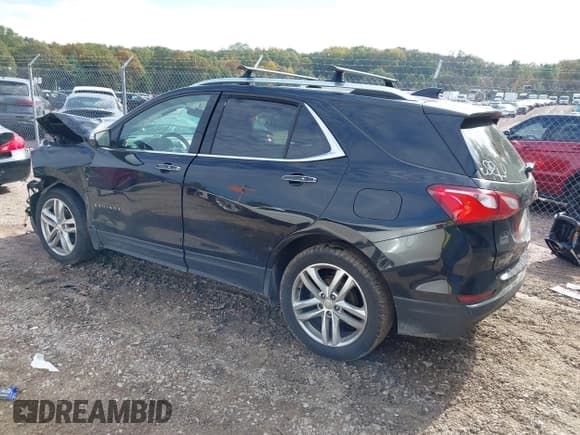 ✅ 2018 Chevrolet Equinox Premier • VIN: 2GNAXWEX6J6156813 • Lot: 43454163. Wystawiony na IAAI z przebiegiem 413 441 mil. Bezpłatny archiwum sprzedaży aukcyjnych z USA i szczegółowy raport historii pojazdu na DreamBid. Zdjęcie 14.