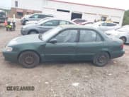 ✅ 2002 Toyota Corolla CE • VIN: 1NXBR12EX2Z564064 • Lot: 42896566. Wystawiony na IAAI z przebiegiem 230 621 mil. Bezpłatny archiwum sprzedaży aukcyjnych z USA i szczegółowy raport historii pojazdu na DreamBid. Zdjęcie 6.