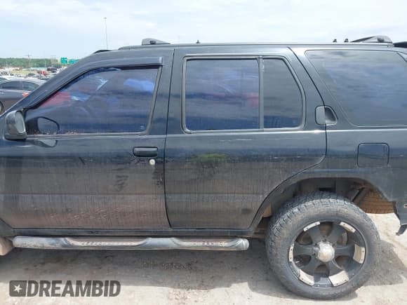 ✅ 1996 Nissan Pathfinder XE • VIN: JN8AR05Y7TW009003 • Lot: 42518021. Listed on IAAI with 190,304 mi. Free auction sales archive from the USA and detailed vehicle history report at DreamBid. Image 14.