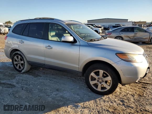 ✅ 2007 Hyundai Santa Fe SE • VIN: 5NMSH13E27H074514 • Lot: 82008584. Listed on Copart with 213,784 mi. Free auction sales archive from the USA and detailed vehicle history report at DreamBid. Image 4.