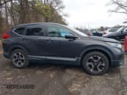 ✅ 2019 Honda CR-V Touring • VIN: 2HKRW2H99KH602129 • Lot: 43855817. Listed on IAAI with 91,135 mi. Free auction sales archive from the USA and detailed vehicle history report at DreamBid. Image 13.