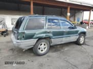 ✅ 2001 Jeep Grand Cherokee Laredo • VIN: 1J4GW48S61C596039 • Lot: 85932785. Listed on Copart with 185,240 mi. Free auction sales archive from the USA and detailed vehicle history report at DreamBid. Image 3.