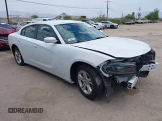 2022 Dodge Charger SXT with VIN 2C3CDXBG5NH161102, listed as a IAAI auction lot 42806227 with 69,601 mi miles and . Bid and sale history available at DreamBid. Image 1.