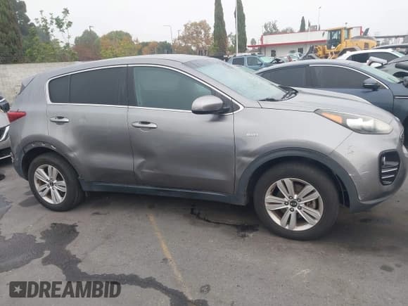 ✅ 2018 Kia Sportage LX • VIN: KNDPMCAC2J7337744 • Lot: 43686652. Wystawiony na IAAI z przebiegiem 127 469 mil. Bezpłatny archiwum sprzedaży aukcyjnych z USA i szczegółowy raport historii pojazdu na DreamBid. Zdjęcie 13.