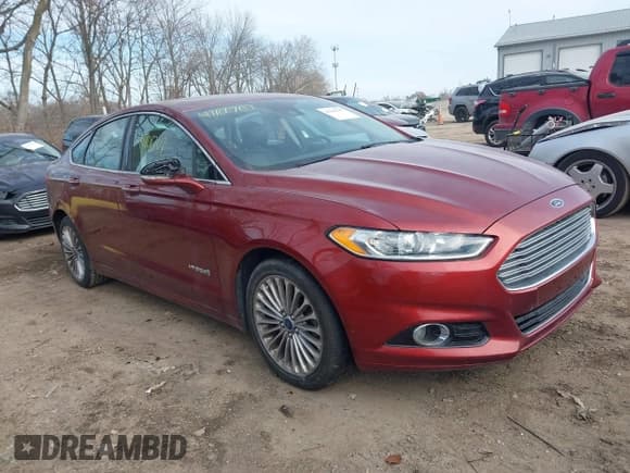 ✅ 2014 Ford Fusion Titanium Hybrid • VIN: 3FA6P0RU9ER175288 • Lot: 41101707. Listed on IAAI with 158,553 mi. Free auction sales archive from the USA and detailed vehicle history report at DreamBid. Image 1.