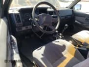 ✅ 1993 Nissan Frontier SE • VIN: 1N6HD16Y3PC380595 • Lot: 53983955. Listed on Copart with 241,016 mi. Free auction sales archive from the USA and detailed vehicle history report at DreamBid. Image 8.