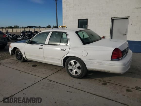 ✅ 2011 Ford Crown Victoria LX • VIN: 2FABP7EV9BX175018 • Lot: 84757965. Listed on Copart with 160,738 mi. Free auction sales archive from the USA and detailed vehicle history report at DreamBid. Image 2.