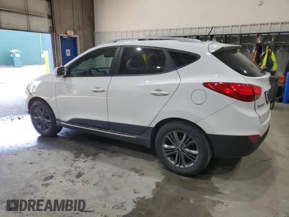 2014 Hyundai Tucson Limited with VIN KM8JUCAG2EU806309, listed as a Copart auction lot 66015735 with 104,328 mi miles and Salvage title. Bid and sale history available at DreamBid. Image 2.