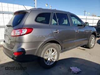 ✅ 2011 Hyundai Santa Fe SE • VIN: 5XYZHDAG4BG057088 • Lot: 79657004. Listed on Copart with 182,461 mi. Free auction sales archive from the USA and detailed vehicle history report at DreamBid. Image 3.