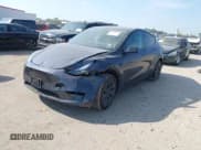 ✅ 2025 Tesla Model Y Long Range • VIN: 7SAYGDED0SA371231 • Lot: 43208101. Listed on IAAI with 7,636 mi. Free auction sales archive from the USA and detailed vehicle history report at DreamBid. Image 2.