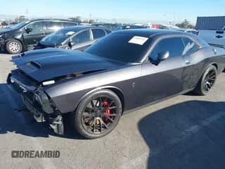 ✅ 2016 Dodge Challenger SRT Hellcat • VIN: 2C3CDZC93GH270902 • Lot: 43863546. Listed on IAAI with 33,410 mi. Free auction sales archive from the USA and detailed vehicle history report at DreamBid. Image 2.