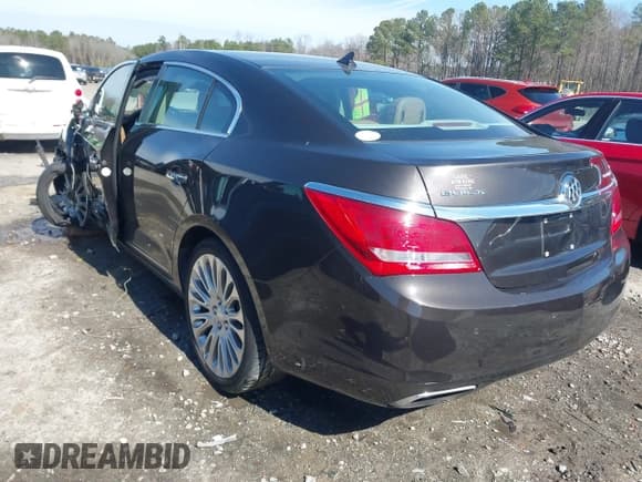 ✅ 2014 Buick LaCrosse Premium II • VIN: 1G4GF5G39EF167595 • Lot: 41581080. Wystawiony na IAAI z przebiegiem 112 905 mil. Bezpłatny archiwum sprzedaży aukcyjnych z USA i szczegółowy raport historii pojazdu na DreamBid. Zdjęcie 3.