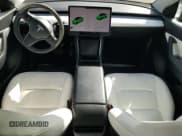 ✅ 2021 Tesla Model Y Standard Range • VIN: 5YJYGDEDXMF103452 • Lot: 82534615. Listed on Copart with 56,910 mi. Free auction sales archive from the USA and detailed vehicle history report at DreamBid. Image 8.