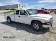 2004 Dodge Dakota Sport z VIN 1D7GL32K44S639553, wystawiony jako Copart lot #69651125 z przebiegiem 197 676 mil mil oraz Szkoda całkowita • Salvage title. Historia ofert i sprzedaży dostępna na DreamBid. Obrazek 4.