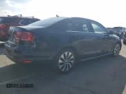 ✅ 2013 Volkswagen Jetta Hybrid • VIN: 3VW637AJ8DM229396 • Lot: 82705825. Wystawiony na Copart z przebiegiem 122 198 mil. Bezpłatny archiwum sprzedaży aukcyjnych z USA i szczegółowy raport historii pojazdu na DreamBid. Zdjęcie 3.