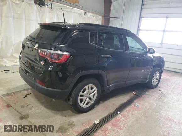 ✅ 2018 Jeep Compass Sport • VIN: 3C4NJCAB2JT463881 • Lot: 91565255. Listed on Copart with 97,612 mi. Free auction sales archive from the USA and detailed vehicle history report at DreamBid. Image 3.