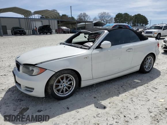✅ 2010 BMW 1 Series 128i • VIN: WBAUN1C5XAVH81789 • Lot: 49798465. Listed on Copart with 128,859 mi. Free auction sales archive from the USA and detailed vehicle history report at DreamBid. Image 1.