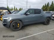 ✅ 2023 Rivian R1T Adventure • VIN: 7FCTGAAA4PN020541 • Lot: 84646875. Wystawiony na Copart z przebiegiem 35 390 mil. Bezpłatny archiwum sprzedaży aukcyjnych z USA i szczegółowy raport historii pojazdu na DreamBid. Zdjęcie 1.