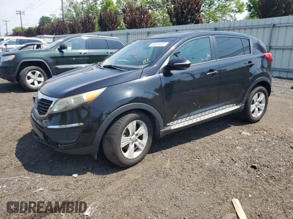 ✅ 2012 Kia Sportage LX • VIN: KNDPB3A20C7317881 • Lot: 59814355. Listed on Copart with 94,938 mi. Free auction sales archive from the USA and detailed vehicle history report at DreamBid. Image 1.