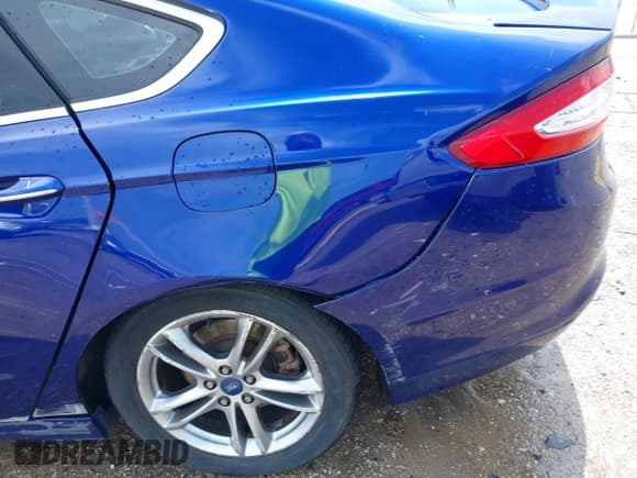 ✅ 2015 Ford Fusion Titanium Hybrid • VIN: 3FA6P0RUXFR126960 • Lot: 42420787. Wystawiony na IAAI z przebiegiem 161 114 mil. Bezpłatny archiwum sprzedaży aukcyjnych z USA i szczegółowy raport historii pojazdu na DreamBid. Zdjęcie 18.