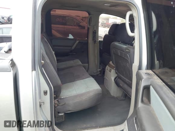 ✅ 2004 Nissan Titan XE • VIN: 1N6AA07A54N593067 • Lot: 41956764. Listed on IAAI with 256,100 mi. Free auction sales archive from the USA and detailed vehicle history report at DreamBid. Image 8.