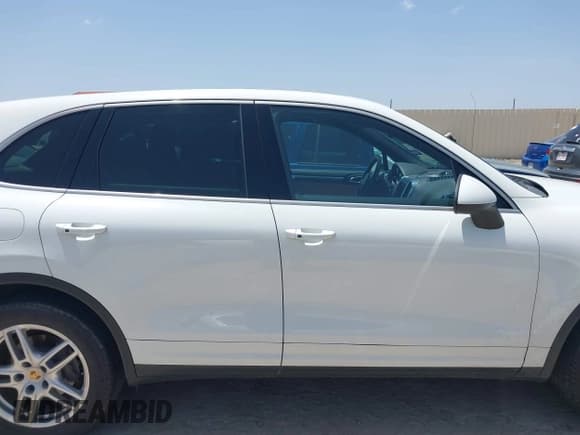 ✅ 2014 Porsche Cayenne • VIN: WP1AA2A21ELA93242 • Лот: 42762961. Опубликован ранее на IAAI с пробегом 99 017 миль. Бесплатный доступ к архиву аукционных продаж из США и подробный отчёт об истории автомобиля на DreamBid. Изображение 13.