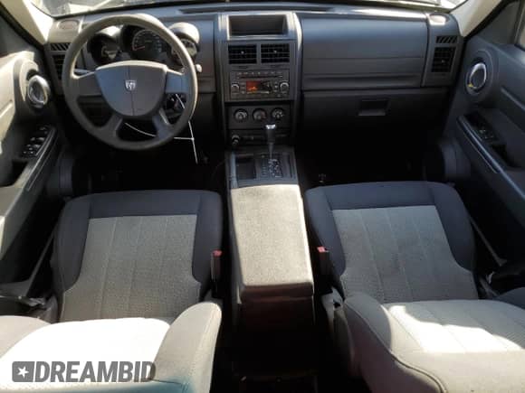 2010 Dodge Nitro SE с VIN 1D4PT2GK3AW105206, выставлен на аукционе Copart как лот 77496764 с пробегом 114 603 миль миль и Чистый • Clean title. История ставок и продаж доступна на DreamBid. Изображение 8.