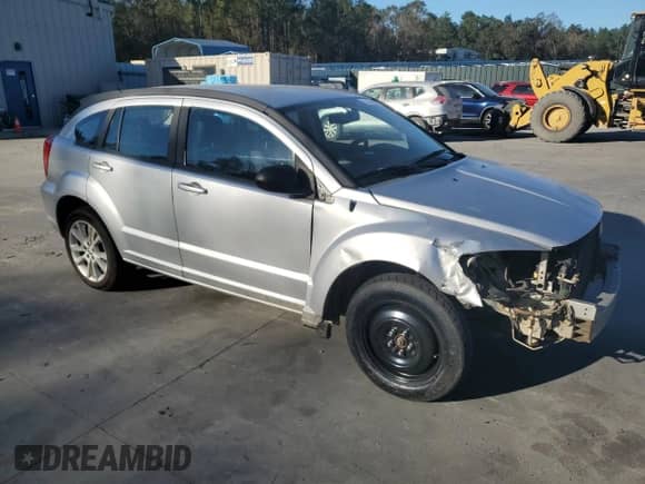2011 Dodge Caliber Heat with VIN 1B3CB5HA1BD214462, listed as a Copart auction lot 75394274 with 176,495 mi miles and Salvage title. Bid and sale history available at DreamBid. Image 4.