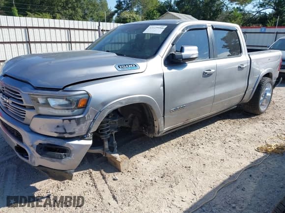 ✅ 2022 Ram 1500 Laramie • VIN: 1C6RREJTXNN125172 • Lot: 43329494. Listed on IAAI with 126,637 mi. Free auction sales archive from the USA and detailed vehicle history report at DreamBid. Image 2.