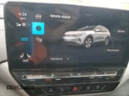 ✅ 2023 Volkswagen ID.4 Pro S • VIN: 1V2WNPE87PC038111 • Лот: 70380155. Опубликован ранее на Copart с пробегом 13 270 миль. Бесплатный доступ к архиву аукционных продаж из США и подробный отчёт об истории автомобиля на DreamBid. Изображение 9.