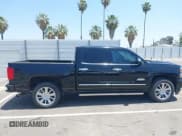 ✅ 2016 Chevrolet Silverado 1500 High Country • VIN: 3GCPCTEC3GG384338 • Lot: 42382874. Wystawiony na IAAI z przebiegiem 120 846 mil. Bezpłatny archiwum sprzedaży aukcyjnych z USA i szczegółowy raport historii pojazdu na DreamBid. Zdjęcie 13.